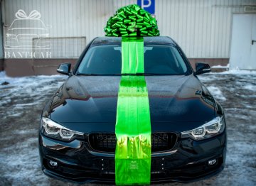 большой подарочный бант на машину автомобиль в москве упаковка огромнымбантиком