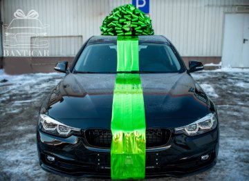большой подарочный бант на машину автомобиль в москве упаковка огромнымбантиком